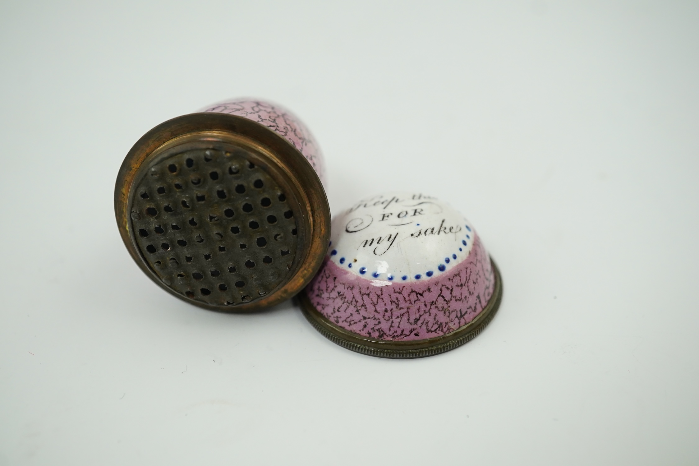 An 18th century South Staffordshire enamel nutmeg grater box, shaped as an egg and inscribed 'Keep This FOR My Sake', 4.5cm high. Condition - good